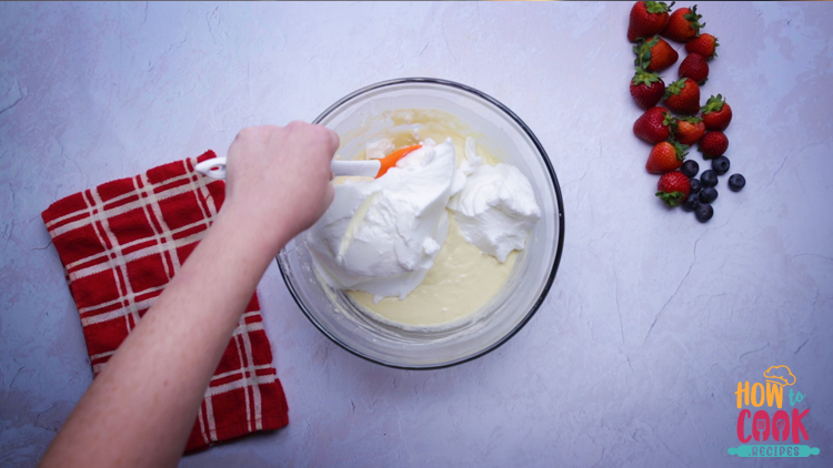 Folding in egg whites into pancake mix